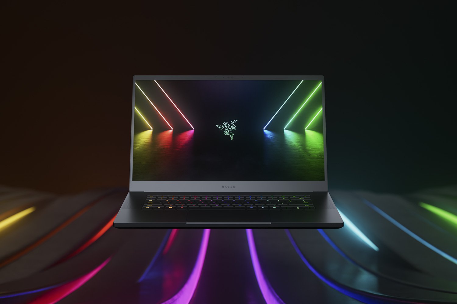 The Razer Blade 15 gaming laptop with RGB lighting on the background.